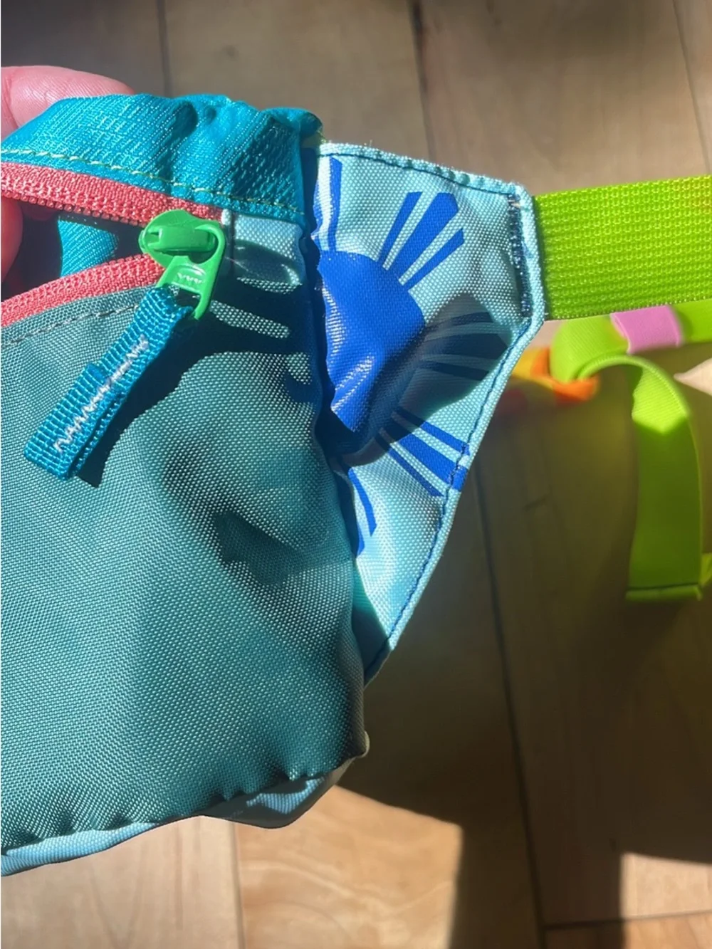cotopaxi turquoise crossbody waist pack with pink zipper and lime strap - Picture 3 of 4